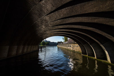 Arch bridge over river