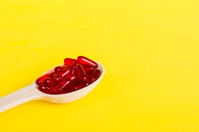 Close-up of heart shape on red background