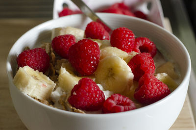 High angle view of strawberries in bowl on table