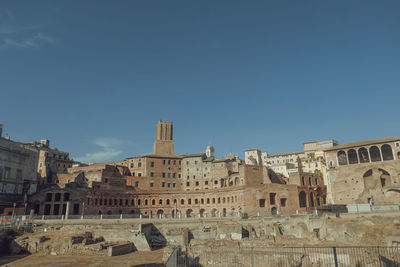 Low angle view of historical building against blue sky