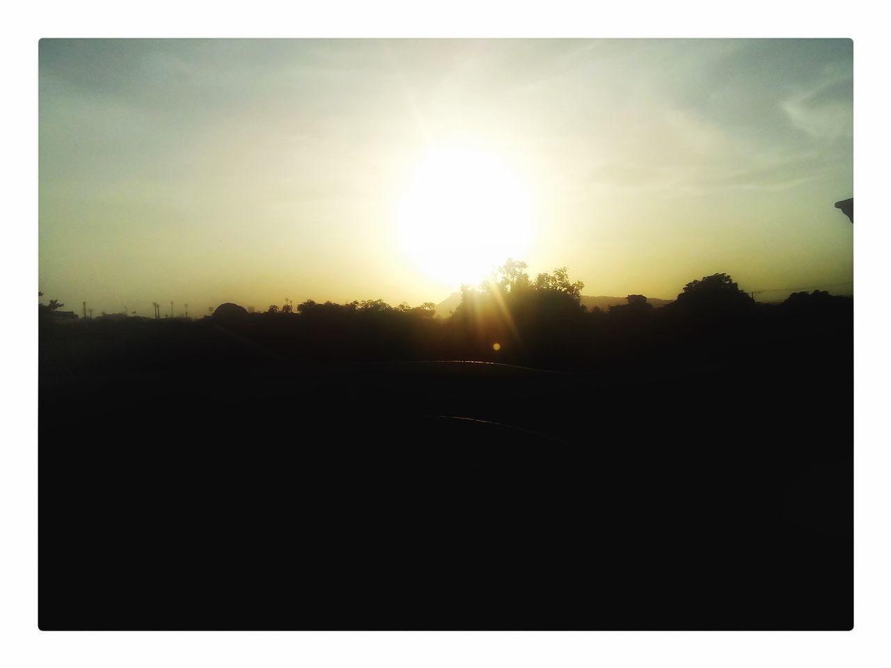 SILHOUETTE LANDSCAPE AGAINST SKY AT SUNSET