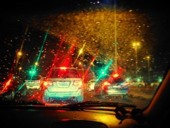 Cars moving on road at night