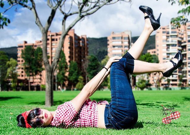 WOMAN STANDING IN PARK