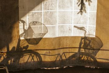 Shadow of bicycles on tent