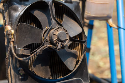 Radiator fan modified car buggy car mounted on the rear of the car.