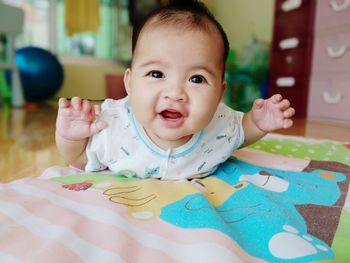 Portrait of cute baby at home