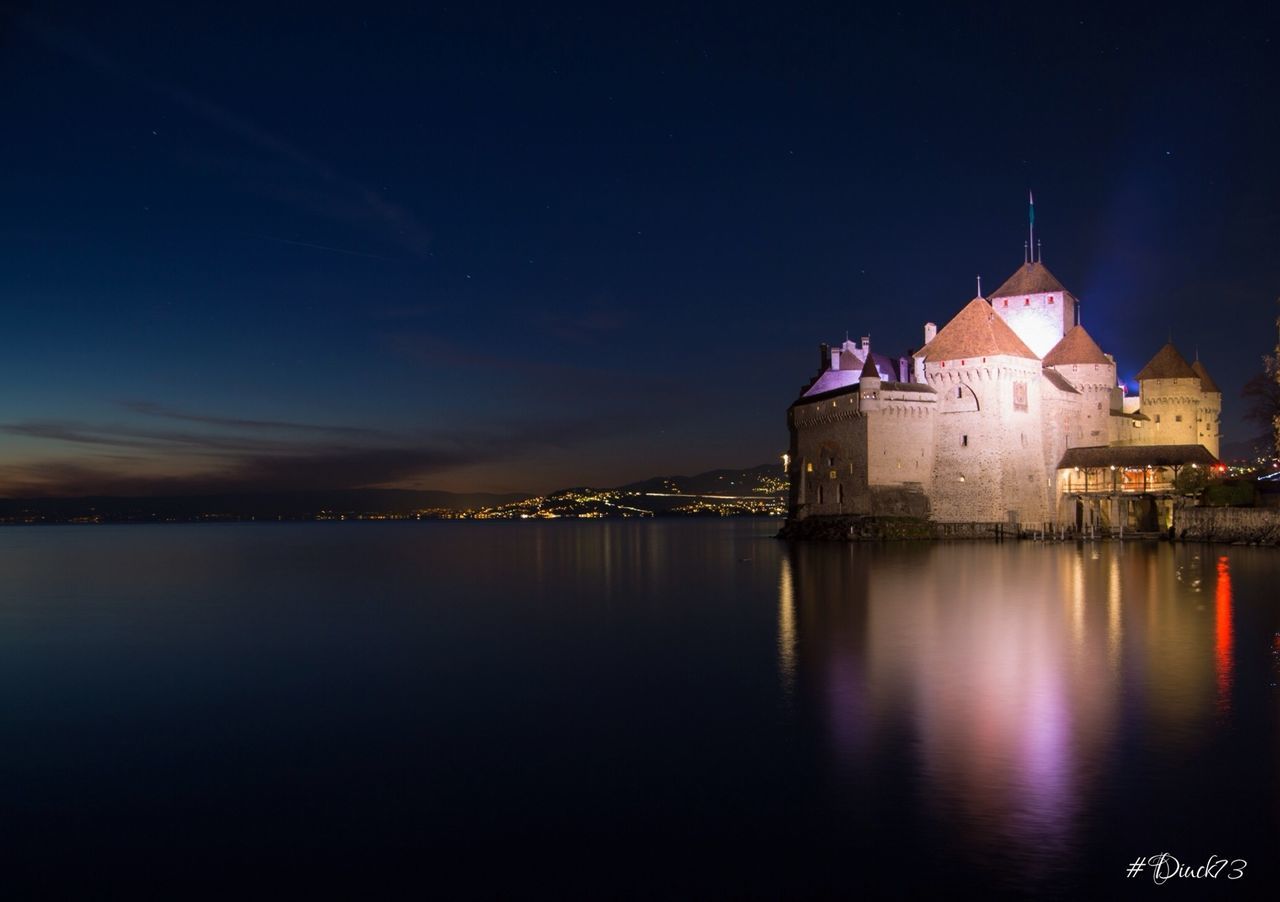 architecture, building exterior, built structure, water, reflection, waterfront, illuminated, sky, night, lake, river, dusk, sea, scenics, city, tranquility, outdoors, blue, house, tranquil scene