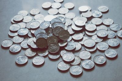 High angle view of coins on table