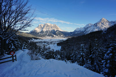 Scenic view of snowcapped mountains against sky