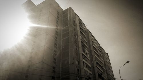 Low angle view of skyscraper against sky