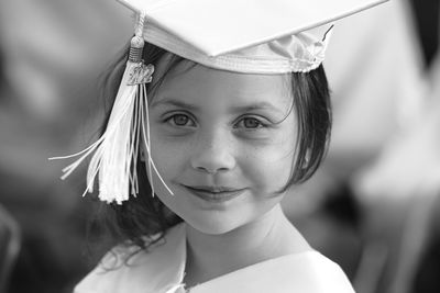 Portrait of young woman wearing hat