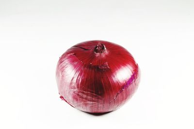 High angle view of apple against white background