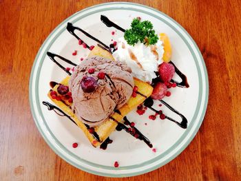 High angle view of ice cream in plate on table