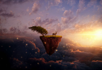 Scenic view of cloudy sky at sunset