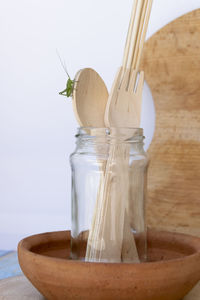 Close-up of glass jar on table