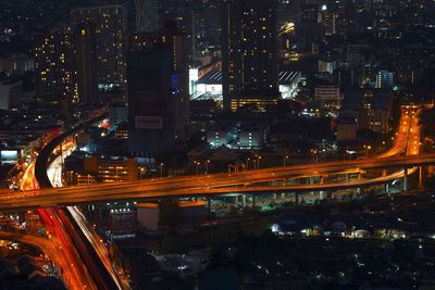 High angle view of illuminated buildings at night