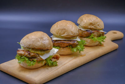 Close-up of burger on cutting board