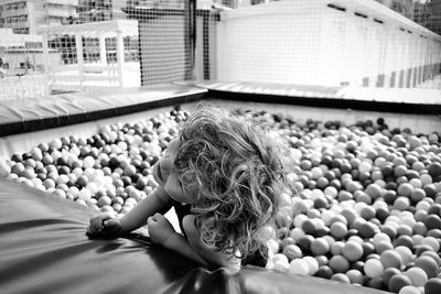 Close-up of boy in pool ball