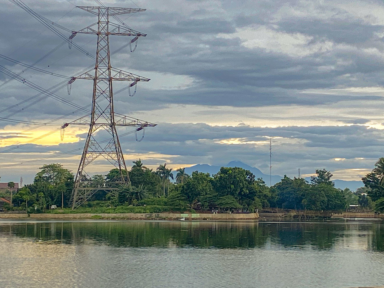 SCENIC VIEW OF LAKE BY TREES AGAINST SKY