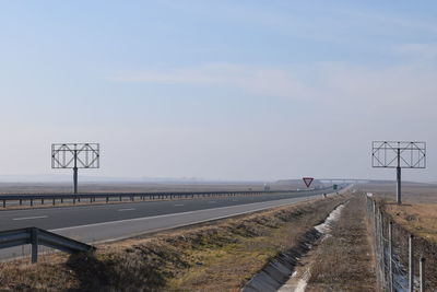 Road amidst landscape against clear sky