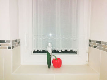 Red berries on table at home
