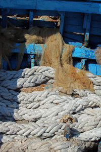 High angle view of ropes tied on wood