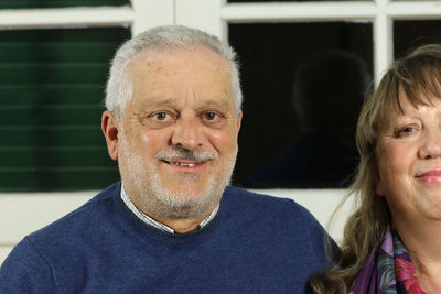 Portrait of smiling man with woman