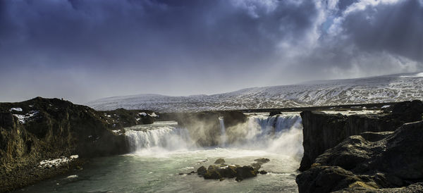 View of waterfall against sky