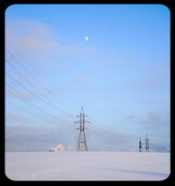 Low angle view of electricity pylon