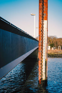 Bridge over river against sky