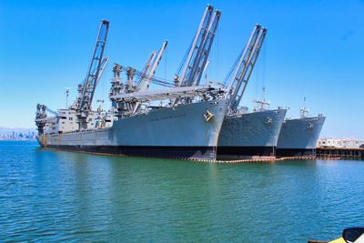 Ship in sea against blue sky