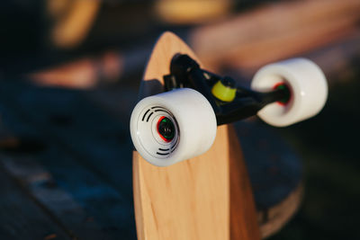Close-up of camera on wood