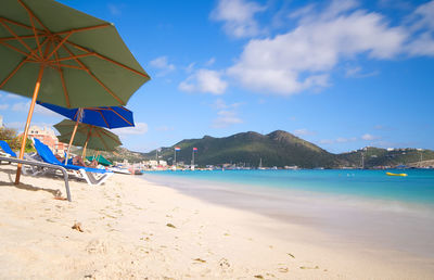 Beach against blue sky