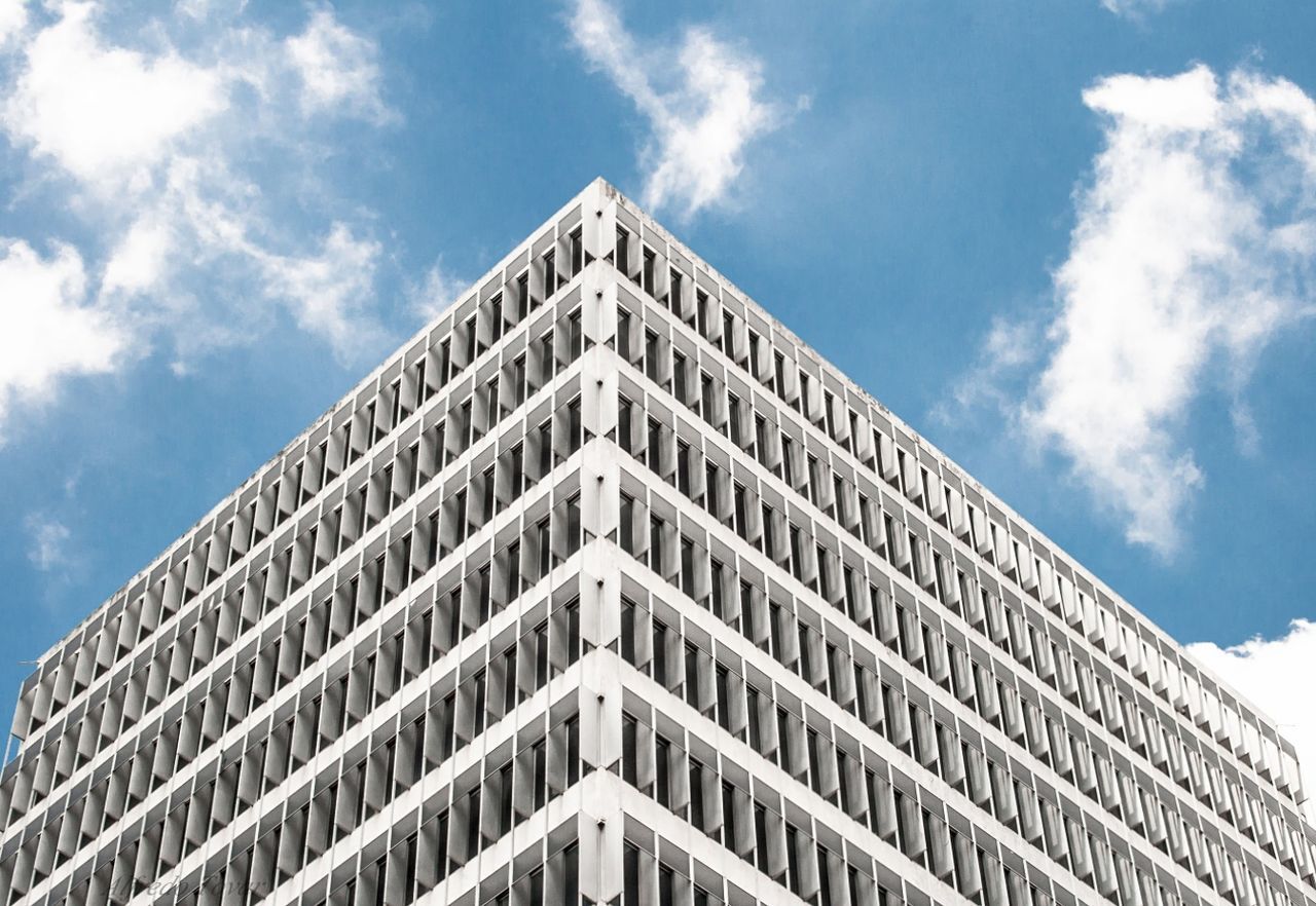 low angle view, sky, building exterior, architecture, built structure, cloud - sky, no people, outdoors, day