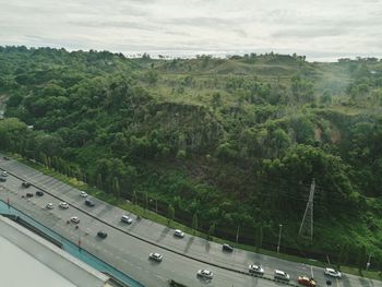 High angle view of road in city against sky