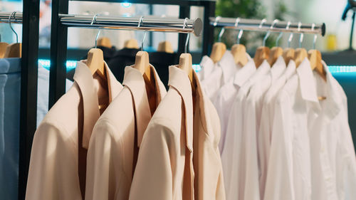 Close-up of clothes hanging on rack