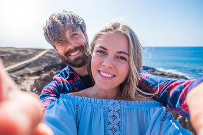 Portrait of smiling young couple