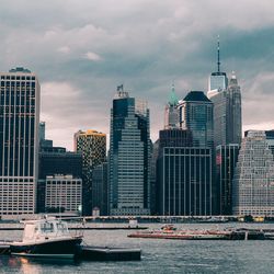 Modern buildings in city against sky