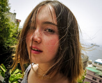 Close-up portrait of beautiful young woman