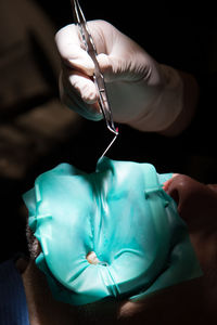 Dentist examining patient