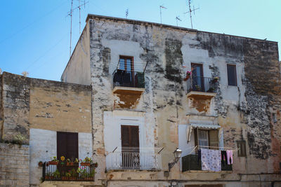 Low angle view of old building against sky