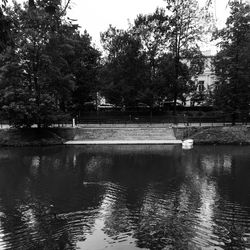 View of lake and trees against sky