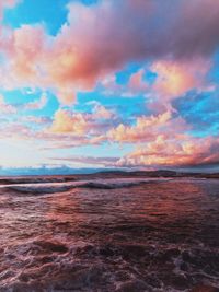 Scenic view of sea against sky at sunset