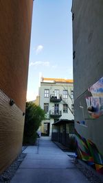 Alley amidst buildings in city