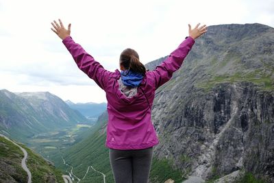 Woman standing on mountain