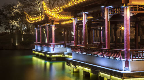 View of illuminated bridge at night