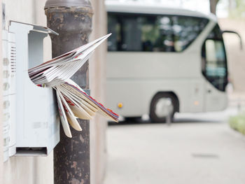 Mails in mailbox against bus