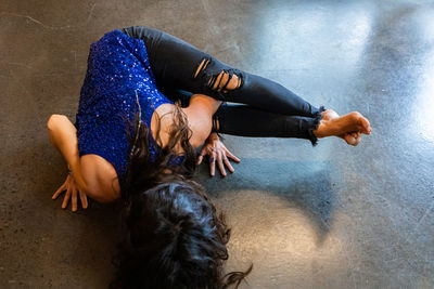 High angle view of woman lying down