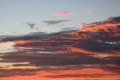 Low angle view of dramatic sky during sunset