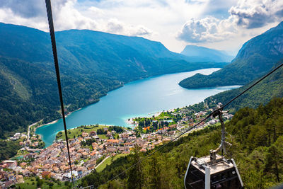 Idyllic landscape of lake of molveno, trentino alto adige, italy, in a cluody and sunnysummer day